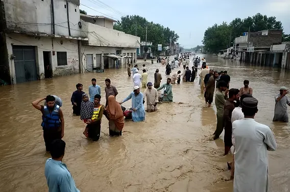 Aerial view of flooded streets and damaged homes in Khyber Pakhtunkhwa.
