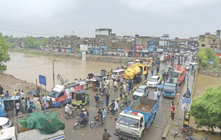 Submerged road in Rawalpindi amid heavy monsoon rains in Pakistan.