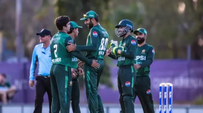 Pakistan Shaheens logo with cricket stadium backdrop.