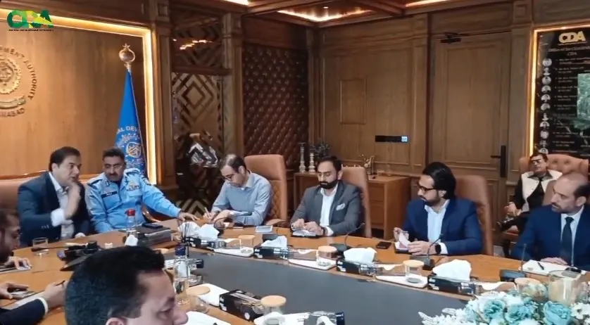 CDA meeting room with officials discussing traffic policy