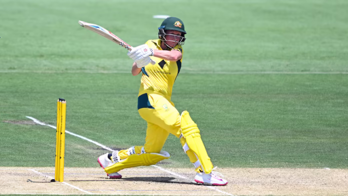 Beth Mooney striking a boundary in the Australia vs India ODI.